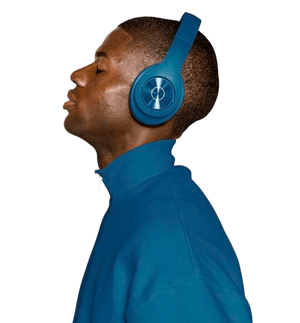 Man wearing blue over-ear headphones